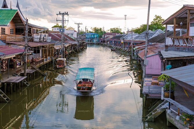 Amphawa Floating Market & Maeklong Railway Train Market Tour - Maeklong Railway Market and the train that cuts through it