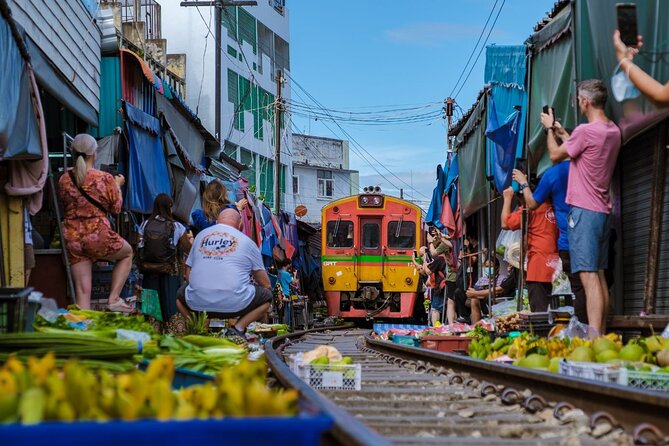 Amphawa Floating Market & Maeklong Railway Train Market Tour - Amphawa after dark: food stalls beside the canal