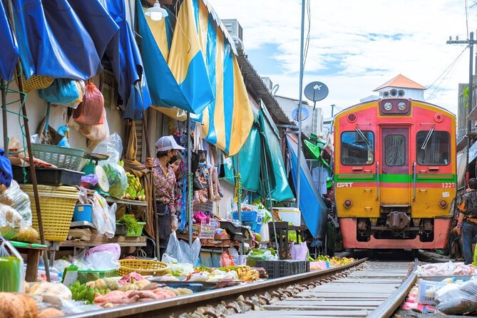 Amphawa Floating Market & Maeklong Railway Train Market Tour - Wat Bang Kung and the banyan-root shrine