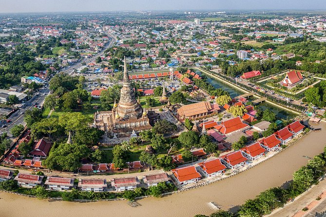 Ancient Wonders of Ayutthaya with Return Scenic River Cruise - Wat Mahathat and Ayutthaya’s famous Buddha image