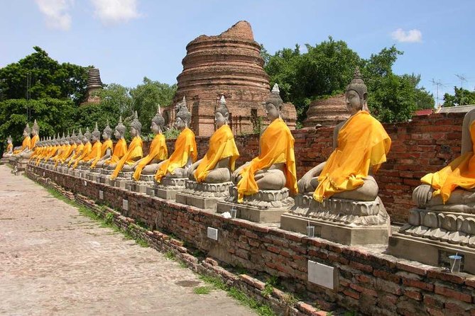 Ayutthaya Tour from Bangkok with Grand Pearl River Cruise - Wat Mahathat and the Buddha in the tree roots