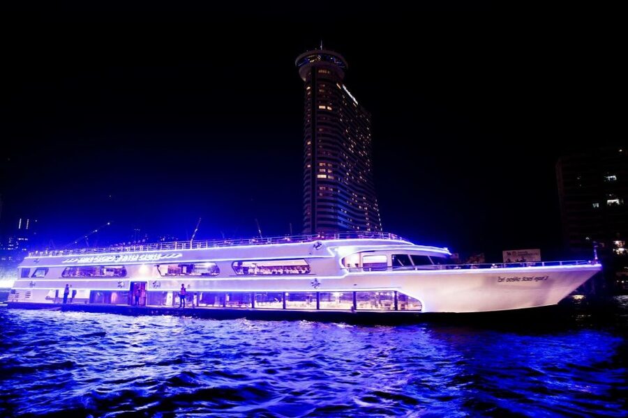 Bangkok: 2-Hour Dinner & Shows on White Orchid River Cruise - Watching Bangkok’s temples from the Chao Phraya