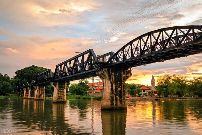 Bangkok: Bridge on the River Kwai and Thailand-Burma Railway Tour - Approaching the bridge by long-tailed boat