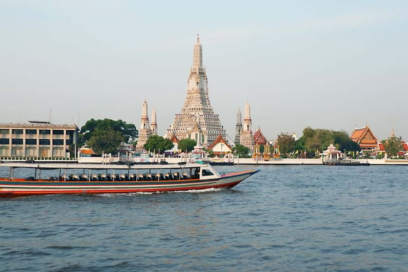 Bangkok: Canal Tour, River Local Life & Wat Arun Guide Visit - What the teak boat adds to the ride