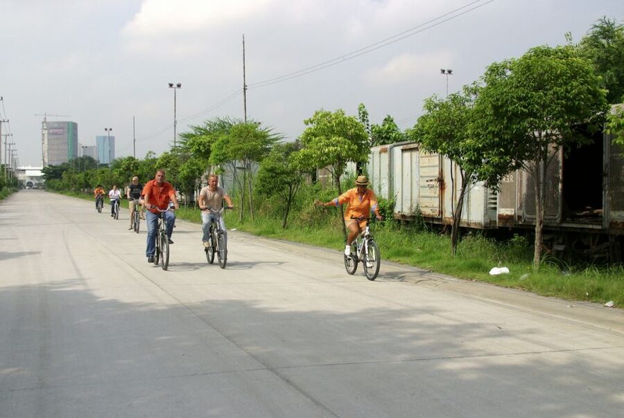 Bangkok: City Culture half-day Bike Tour - Crossing Rama IV Road toward Benjakitti Forest Park