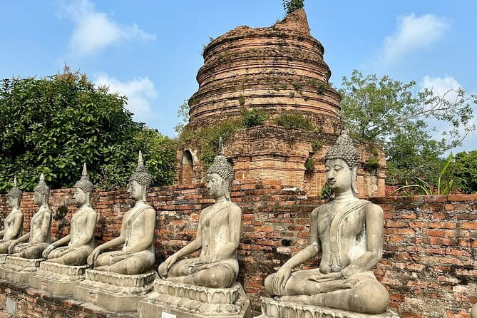 Bangkok Classic 3-Temples With Buffet Lunch Day Tour - Wat Paknam brings a quieter final stop