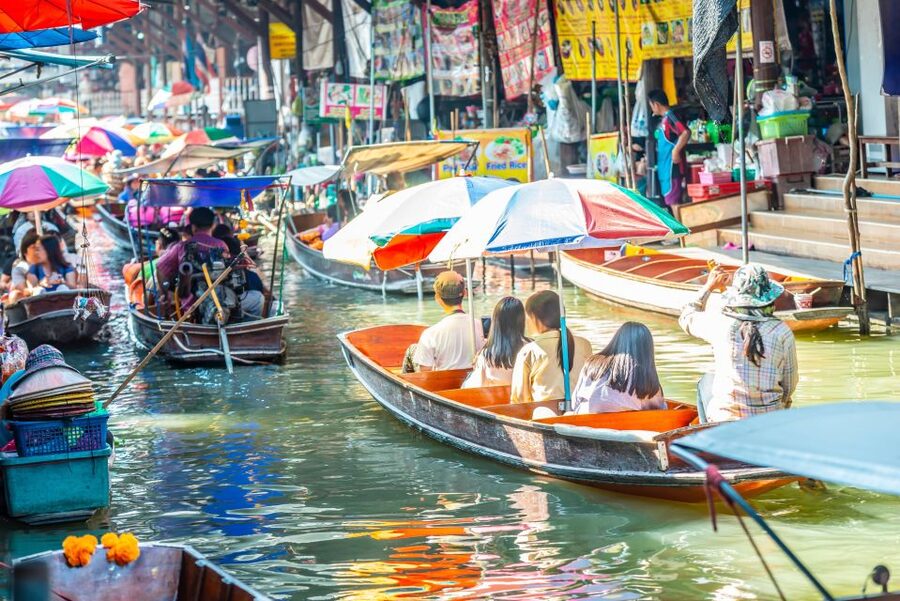Bangkok: Damnoen Saduak, Train Market & Mahanakhon Day Trip - Riding into Maeklong Railway Market