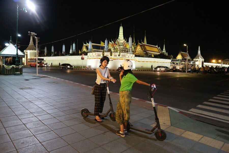 Bangkok: E-Scooter Night Tour with Local Street Food - Crossing the Chao Phraya by local ferry