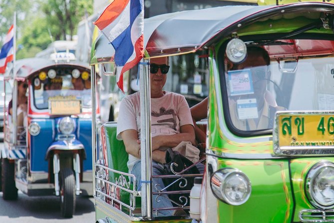 Bangkok Electric Tuk Tuk: Thonburi, Wang Lang & Food Tour - The guide is a major part of the value