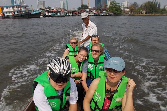 Bangkok Green Oasis 4-Hour Bike Tour with Boat Ride - Sri Nakhon Khuean Khan Park and the fish ponds