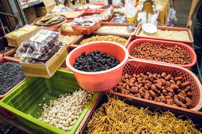 Bangkok Hidden Gems: Talad Noi, Chinatown & Street Food Tour - Crossing into Chinatown after dark