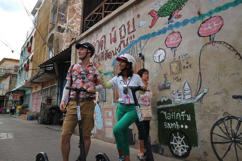 Bangkok: Riverside E-Scooter Adventure with StreetFood Snack - Tha Din Daeng Market and a proper food break