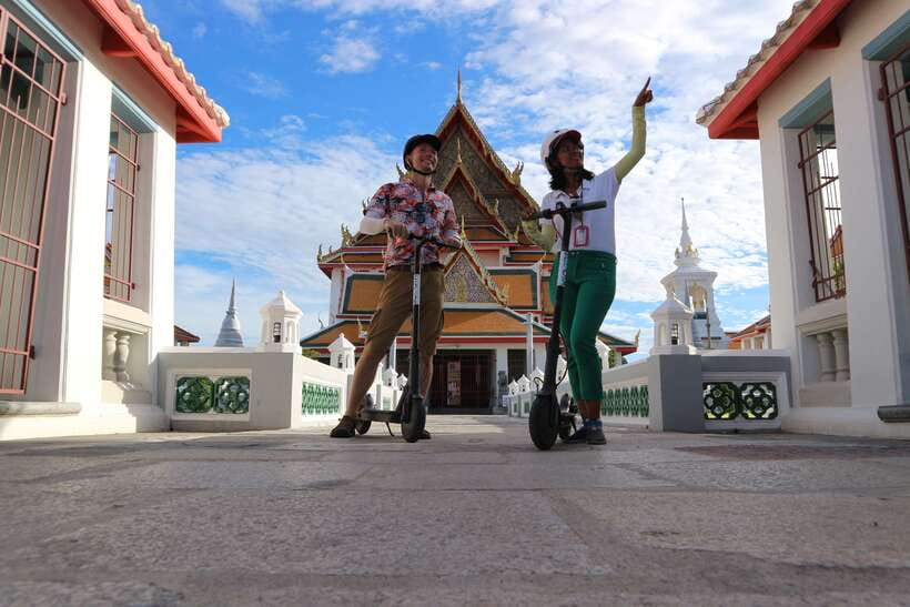 Bangkok: Riverside E-Scooter Adventure with StreetFood Snack - A local ferry across the Chao Phraya