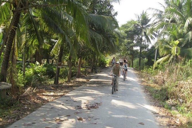 Bangkok Tour by Boat and Bike - Cycling through villages, temples, and markets
