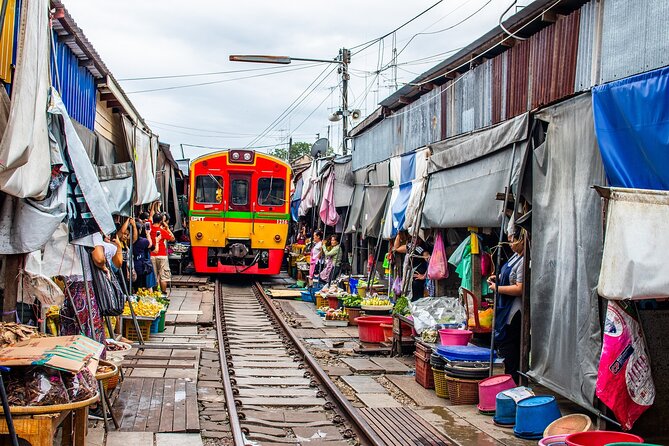Damnoen Saduak Floating Market and Maeklong Railway Market Tour - Wat Bang Kung is the quiet surprise