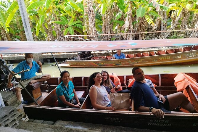 Floating & Railway Markets and Erawan Waterfall [Optional Luxury] - Riding the train into Mae Klong Railway Market