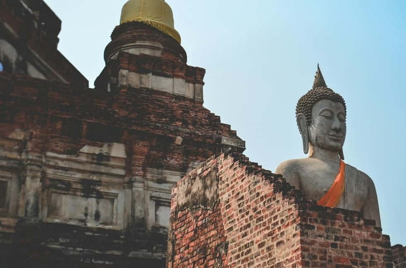 From Bangkok: Ayutthaya Heritage Tour with Sunset Boat Ride - A fruit market snack and a taste of local life