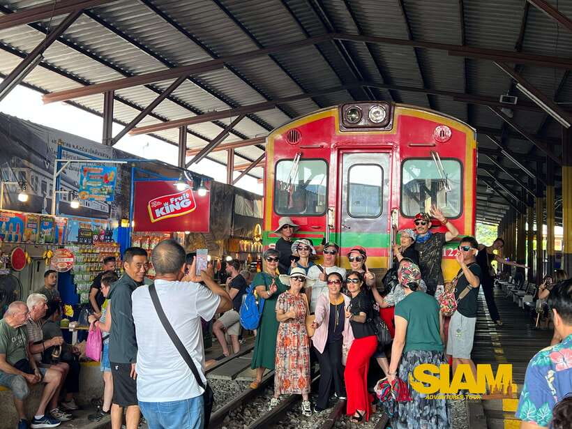 From Bangkok:Damnoen Floating Market and Railway Market Tour - Seeing the train pass through Maeklong Market