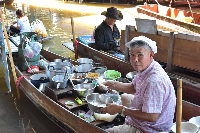 From Bangkok : Kanchanaburi Tour with Floating market Visit - Watching a train squeeze through Maeklong Railway Market