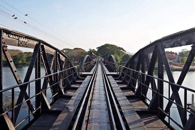 Full-Day Kanchanaburi River Kwai & Death Railway Private Tour - Approaching the Bridge on the River Kwai by boat