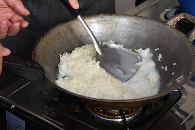 Hands-on Thai Cooking Class & Market Tour in Sukhumvit - Cooking four dishes at your own station
