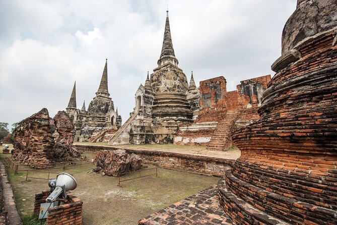 Lopburi Monkey Temple & Ayutthaya Old City Tour From Bangkok - Wat Mahathat and the Buddha head in tree roots