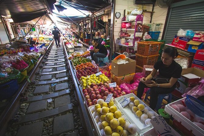 Maeklong Railway Market and Damnoen Saduak Floating Market Tour From Bangkok - Damnoen Saduak by long-tail boat