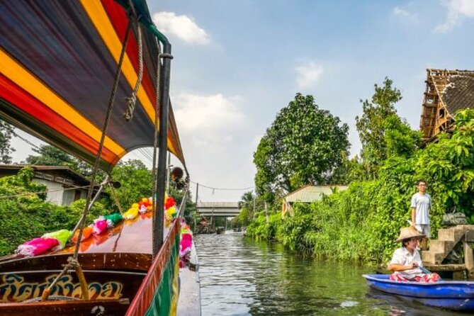 Private Damnoen Saduak Floating Market and Train Market Tour - Approaching Damnoen Saduak by canal