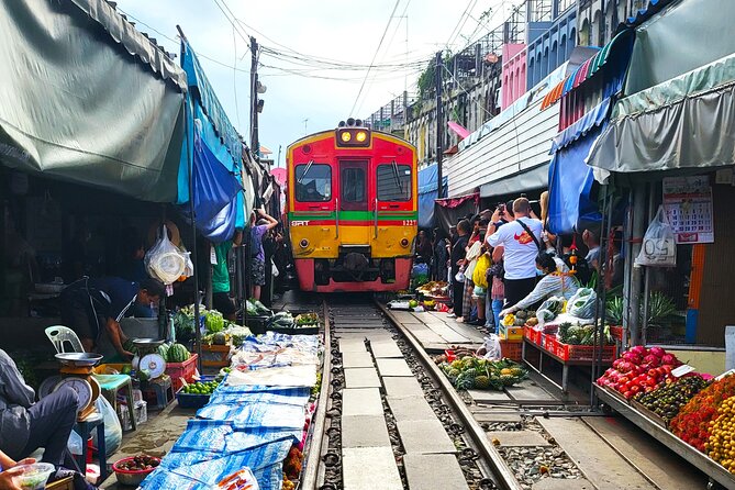 Private Tour to Railway Market, Floating Market And Ayutthaya - Wat Mahathat and the famous Buddha image