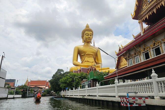 Private tour to Wat Pho,Wat Arun, Canal Tour,Flower Market - One Hour Along Bangkok’s Canals