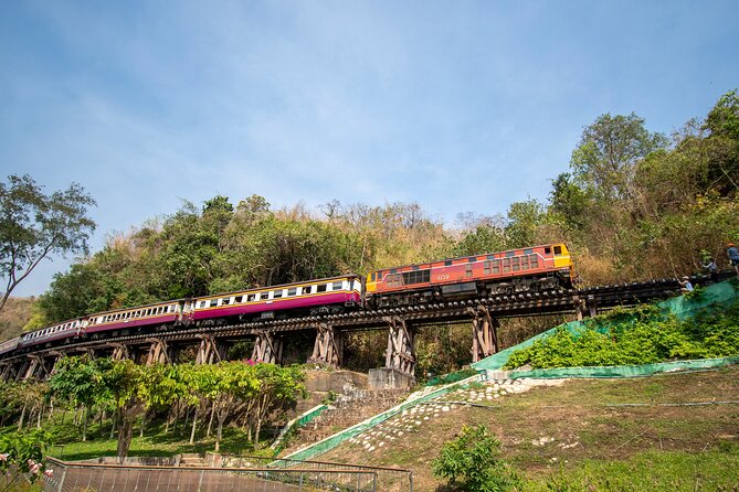 River Kwai Jungle Rafts: 2-Day Kanchanaburi Escape from Bangkok - The bridge and the first long-tail boat