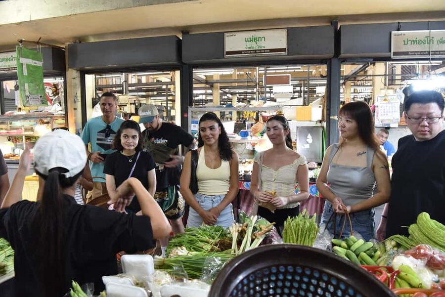 Sathon: Hands-on Thai Cooking Class & Market Tour in Bangkok - A one-minute walk into Suan Phlu Market