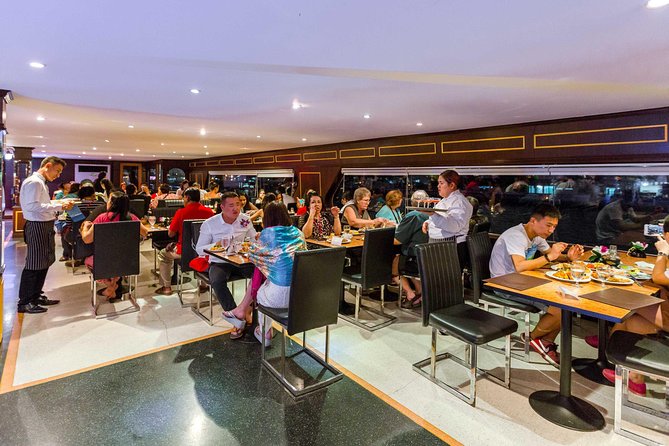 The White Orchid: Chao Phraya Dinner Cruise Experience - Rama VIII Bridge and the royal barges