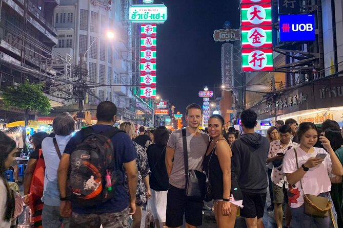 Tuk-tuk tour Bangkok by Night with Chinatown meal and hotel transfers - Crossing the Chao Phraya to Wat Arun