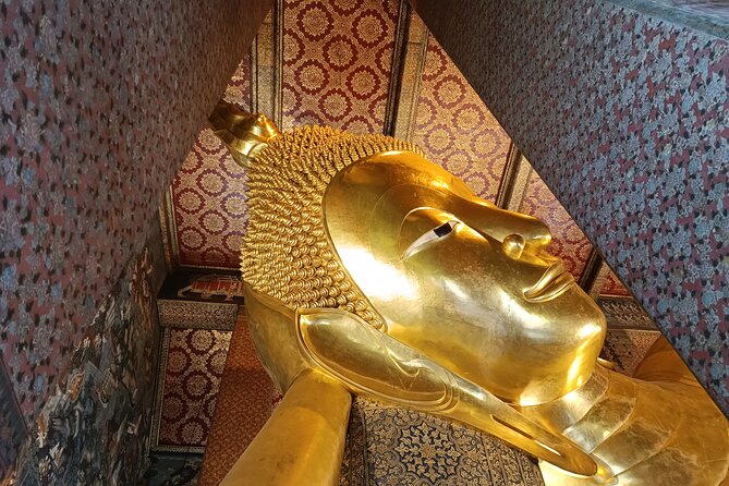 Visit Wat Pho and Wat Arun with Local Expert - Two Bangkok temples, two very different moods